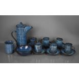A Studio pottery coffee set, comprising six cups and saucers, sugar bowl, jug and coffee pot.