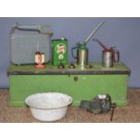 A Paramo heavy duty vice together with vintage oil cans, fuel can, green wooden tool box and a