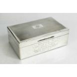 A silver cigarette box, presentation engraved, William Comyns & Sons Ltd (Richard Comyns), London