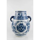 A large 20th century Chinese blue and white vase, with twin elephant handles, 50cm high.