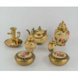 A group of cloisonne ware comprising a teapot, candlestick, jars and two pot pourri bowls.