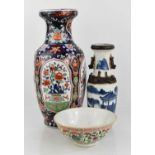 A group of Chinese pottery, to include a blue and white baluster vase, a polychrome enamelled