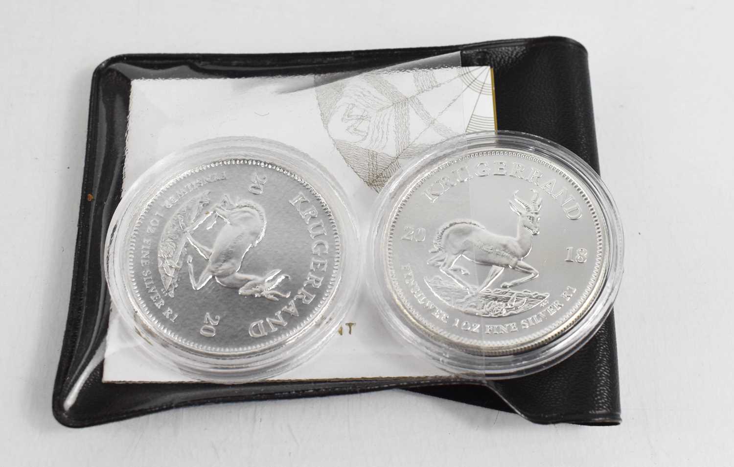 Two silver 1oz Krugerrands, mint.