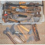A large quantity of vintage tools to include, wood chisels, hammers, saws, billhook and axes.
