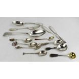 A group of assorted silver flatwares including a fiddle pattern tablespoon and matching fork and