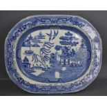 A large Victorian blue and white Willow Pattern meat platter.