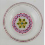 A Peter McDougall millefiori dish with white latticino base.