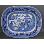 A large Victorian blue and white Willow Pattern meat platter.
