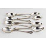 A set of eight silver teaspoons, with beaded decoration, 3.86toz.