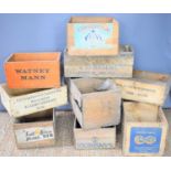 A group of vintage wooden crates to include Watney Mann, Kersbrook apples and others.
