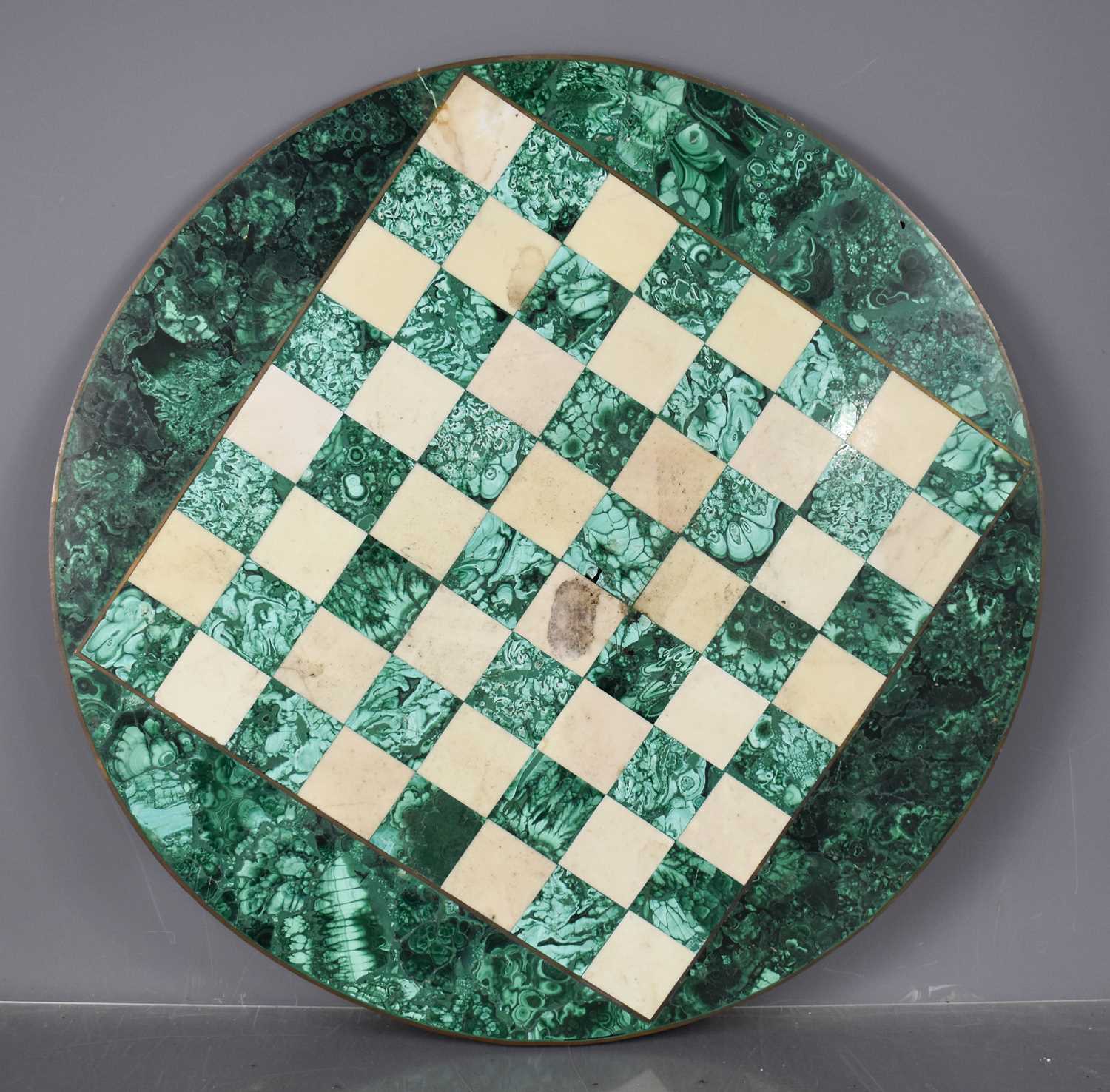 An antique malachite chess board, 52cm high. A/F