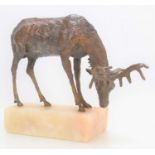 Trevor Faulkner A.R.C.A, F.R.B.S. (1929-2020): a bronze sculpture of a red deer stag, grazing,