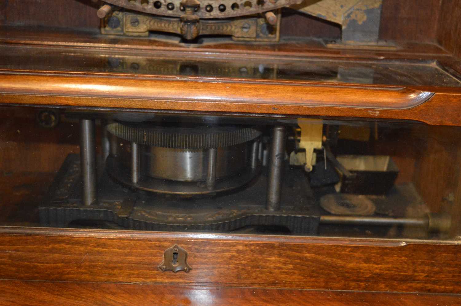 A late 19th century mahogany cased "Penny in the Slot" Polyphon music box on associated mahogany - Image 4 of 19