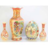 A Japanese Satsuma ware porcelain egg decorated with Geishas together with three vases depicting