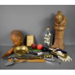 A group of collectables to include ship in a bottle, Inuit carved figure, costume jewellery,