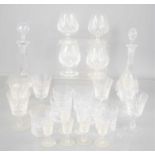 A group of crystal glasses and decanters to include Edinburgh crystal.