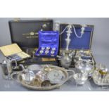 A collection of silver plate including a three branch candelabrum, serving dish, tray, tea set,