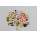 A group of vintage Shell, BP and HP pin badges to include a metal Shell example by J.R Gaunt.