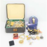 A vintage jewellery box together with a group of jewellery to include brooches, gold plated rings,