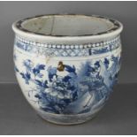 An antique Chinese blue and white jardiniere, decorated with birds and flowers, 32cm high.