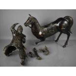 A 19th century cast metal bronze patinated Samurai on horseback, A/F, the horse 48cm long.