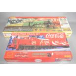 A Hornby "Flying Scotsman" electric train set together with a Hornby Coca-Cola Christmas train set