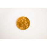 An Edward VII full gold sovereign dated 1906.