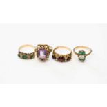 A group of four 9ct gold rings comprising a scroll set, emerald cut amethyst, of approximately 11.