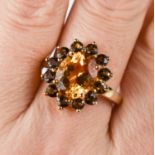 A 9ct gold, yellow and smokey citrine ring of cluster form, size R, 5.1g.