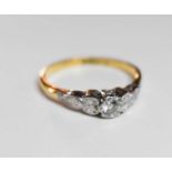 An 18ct gold and diamond ring, size Q, 2.9g.