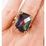 A 10ct gold and watermelon tourmaline dress ring, the faceted rectangular stone of approximately