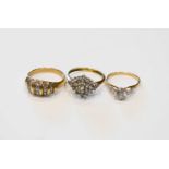 A group of three 9ct gold and white stone rings, comprising a solitaire with smaller stone to the