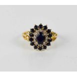 A 9ct gold, diamond and sapphire cluster ring, size R, 3.7g.
