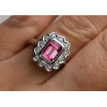 An 18ct white gold, pink tourmaline and diamond ring, size N, 6.9g.