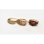 A group of three 9ct gold dress rings, one set with ten aquamarines, each approximately 2.5mm,