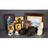 A group of collectables to include Pharoah model, pair of wooden carved elephants, Indonesian carved