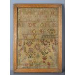 A William IV cross-stitch sampler, embroidered on linen with two alphabets above birds, trees and