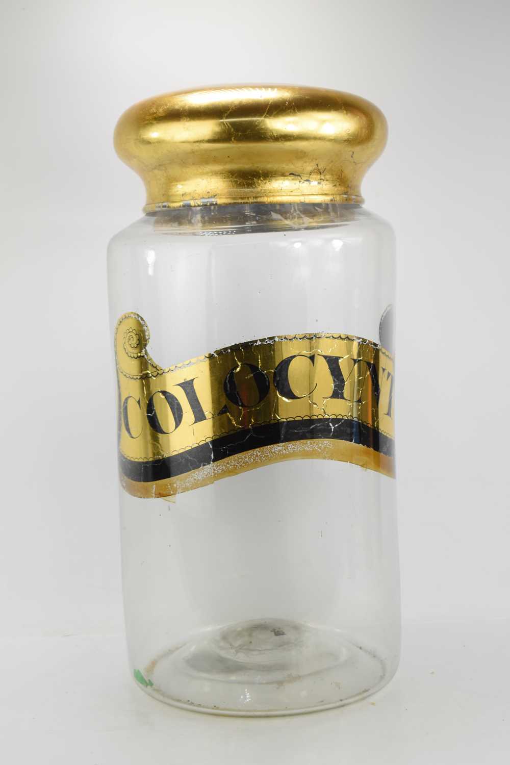 A 19th century hand-blown glass apothecary dispensing jar of considerable size with reverse