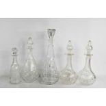 Five cut glass decanters of various form to include a pair, all with original stoppers.