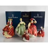 A group of Royal Doulton figurines comprising Top O' the Hill HN1834, Fair Lady HN2193, Buttercup