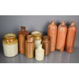 A group of stoneware bottles and jars to include three 19th century Georg Kreuzberg water bottles.