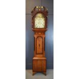 A 19th century longcase clock by Bellatti of Lincoln, with a hand painted Roman numeral dial,