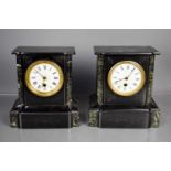 A near pair of French 19th century slate mantle clocks with Roman numeral dials.