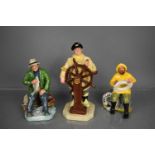 Three Royal Doulton figurines; A Good Catch HN2258, The Helmsman HN2499, and The Boatman HN2417.