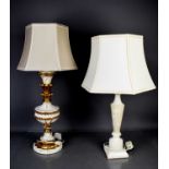 Two modern lamp bases, one carved wooden example painted white and gold, the other an agate