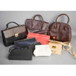A group of vintage handbags to include Marks and Spencer, Radley and others.