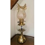 A Victorian style glass and brass parafin lamp, the etched shade having criped edge together with