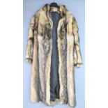 A vintage Echter Pelz coyote fur coat.