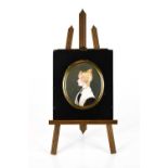 A 19th century Victorian portrait miniature of a young lady, painted in profile, with a white shawl,