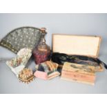 A Victorian pin cushion, two fans, a box containing feather hair accessories, boxes and other items.